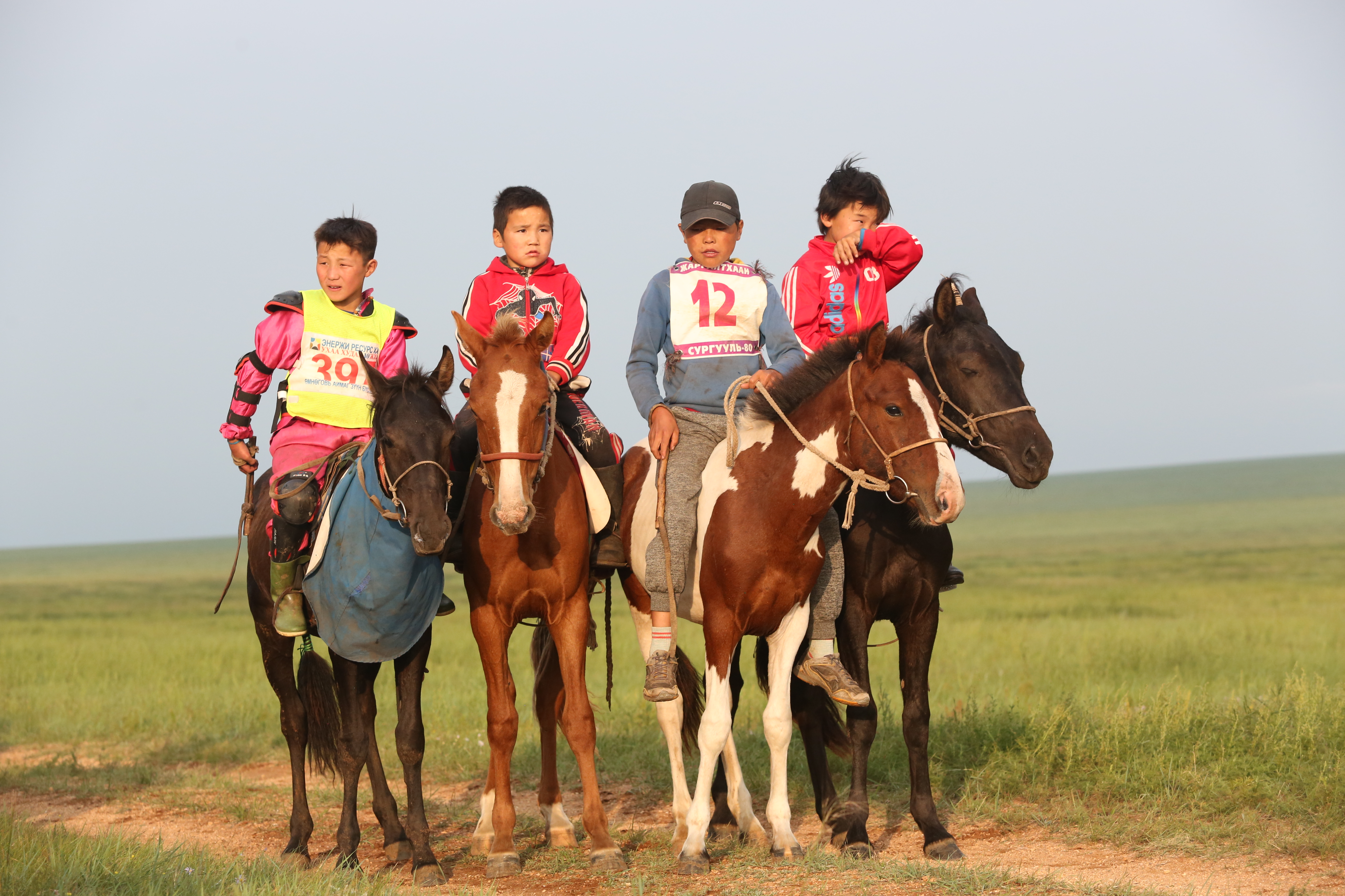  Jockeys of the Steppe Horse racing is the #1 sport in Mongolia and young boys are the jockeys. These locals show their amazing riding skills to the officials and riders!